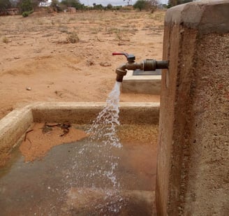 Sustainable water well in an African village providing clean drinking water to rural communities