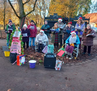 The Choir singing carols in Longford Park