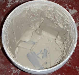 bucket of drywall compound