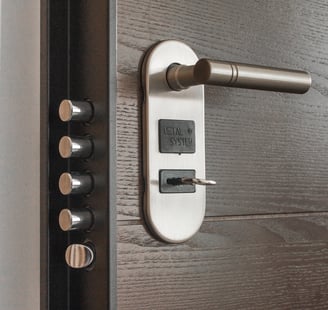 a door handle latched door with a key lock