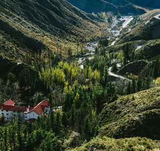 a house in the mountains with a red roof Villavicencio Mendoza Argentina