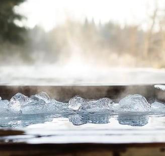 a hot tub with ice cubes in the water