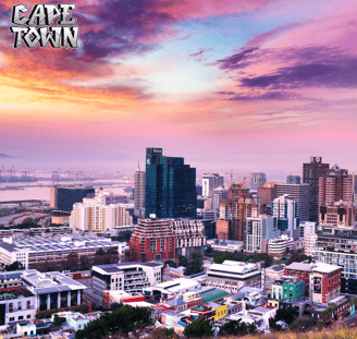 a city skyline with a colorful sunset and a view of the city