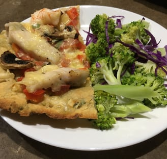 portioned pizza with vegetables