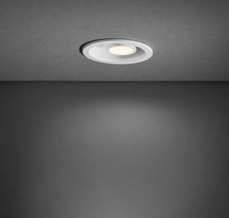 a bathroom light fixture with a recessed ceiling light