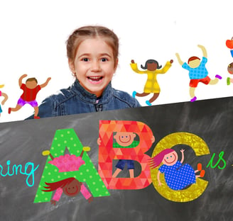 a girl holding a sign that says abc abc