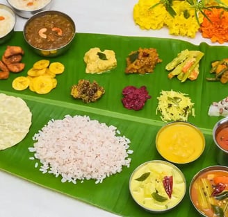 Sadya a meal of Kerala origin and of importance to all Malayalis, consisting of a variety of traditional vegetarian dishes.
