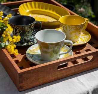 A tray with a cups from hand-made products available on Sedoya website