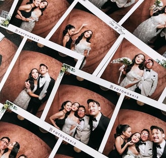 a couple of people posing for a photo booth