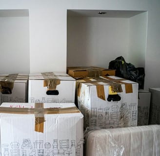 boxes from old home before moving cleaning service