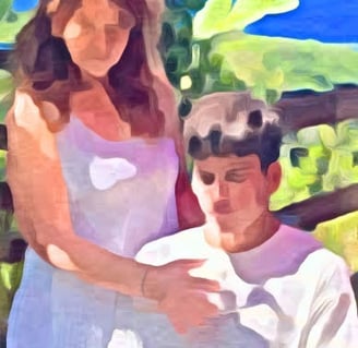 a woman and a man sitting on a bench