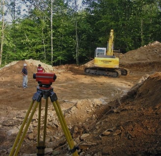 a man standing in front of a construction site