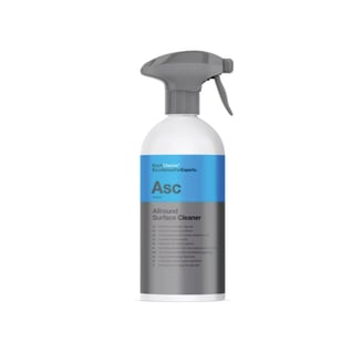 Flacon de 500 ml de produit nettoyant pour surfaces, avec étiquette et spray intégré.
