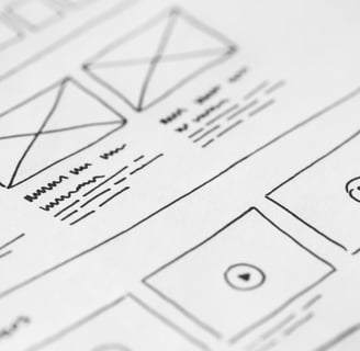 A form or design sheet, with boxes and squiggles