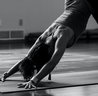 a woman doing a handstand yoga pose