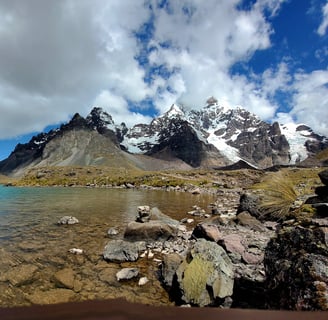 a lake with a mountain in the background