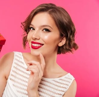 Smiling Woman with Christmas Present