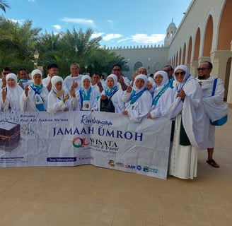 a group of people standing around a banner
