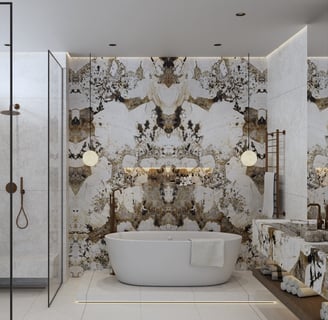 Luxurious bathroom with a white freestanding bathtub against a Patagonia Marble wall.