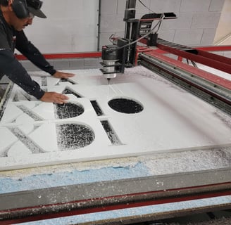 One of our employees working on one of our signs