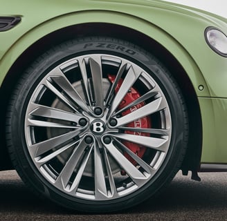 a close up of a car's wheel and tire