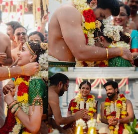 Sharing garland to each other in a wedding