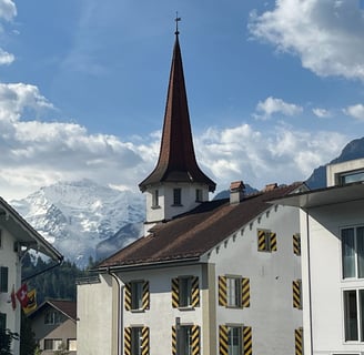 Jungfrau behind Schloss Unterseen in Interlaken Switzerland