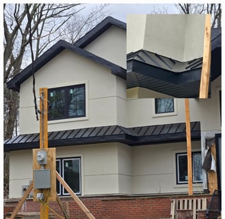 Residential roof and gutter replacement project in progress