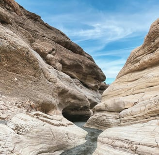 Death Valley, CA - Unexpected rains in the desert create a flash flood thru desert canyons