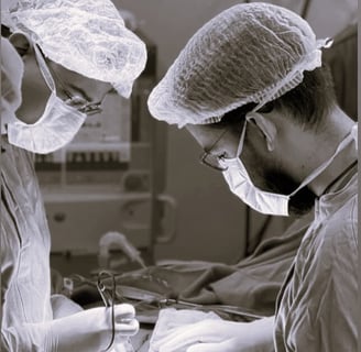 Cirurgiões operando tumor do aparelho digestivo