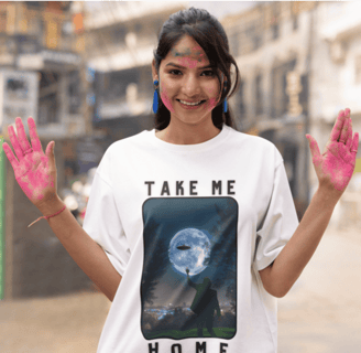 a woman with painted hands wearing a printed tshirt