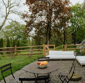 a patio with a couch and a table
