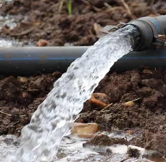 a pipepipe with water flowing out of it
