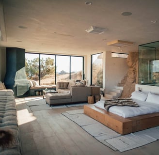 a bedroom with a bed and a couch