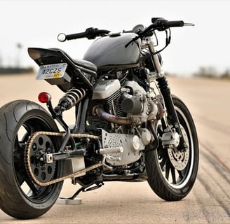 Custom motorcycle parked on road