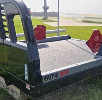 a truck with a red stop sign on the back of it