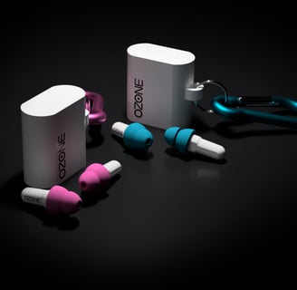 Image of pink and cyan earplugs