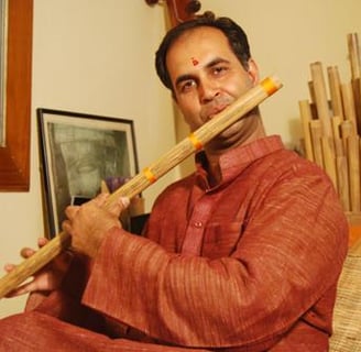 Flutist Ravi Shankar Mishra playing bamboo flute