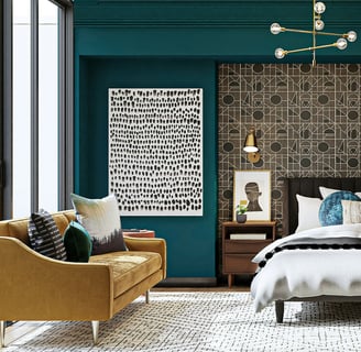 a bedroom with a bed and a chair
