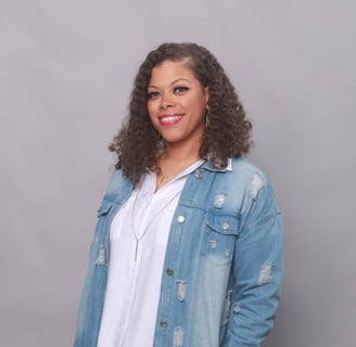 Picture of a woman against a grey background