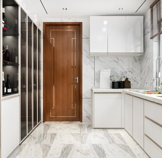 a kitchen with a wooden door and a wooden door