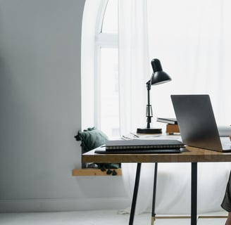 woman typing on a laptop