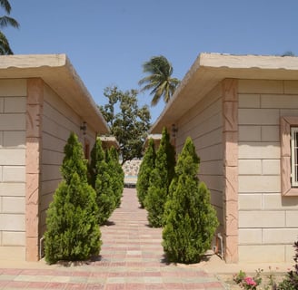 Een aantrekkelijke afbeelding van Apparthotel La Perle in Senegal, met moderne, comfortabele apparte