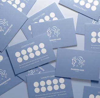 Beauty salon business cards: featuring branding elements and contact information.