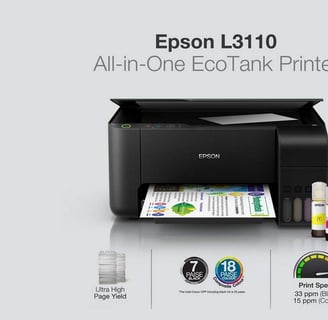 Close-up of the Epson L3110's EcoTank system with visible ink levels.