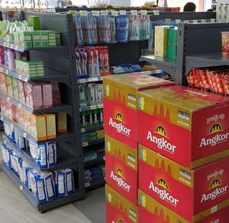 a store display of a variety of drinks and snacks
