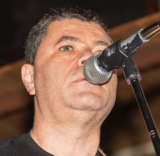 a man with a microphone and a microphone