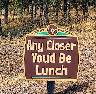 Roseburg, OR Travel - Sign at entrance to Wildlife Safari: Any Closer and You'd be Lunch