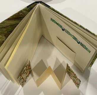 Album with marbled paper and decorative pages