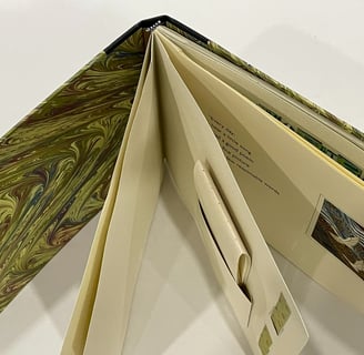 Album with marbled paper and decorative pages